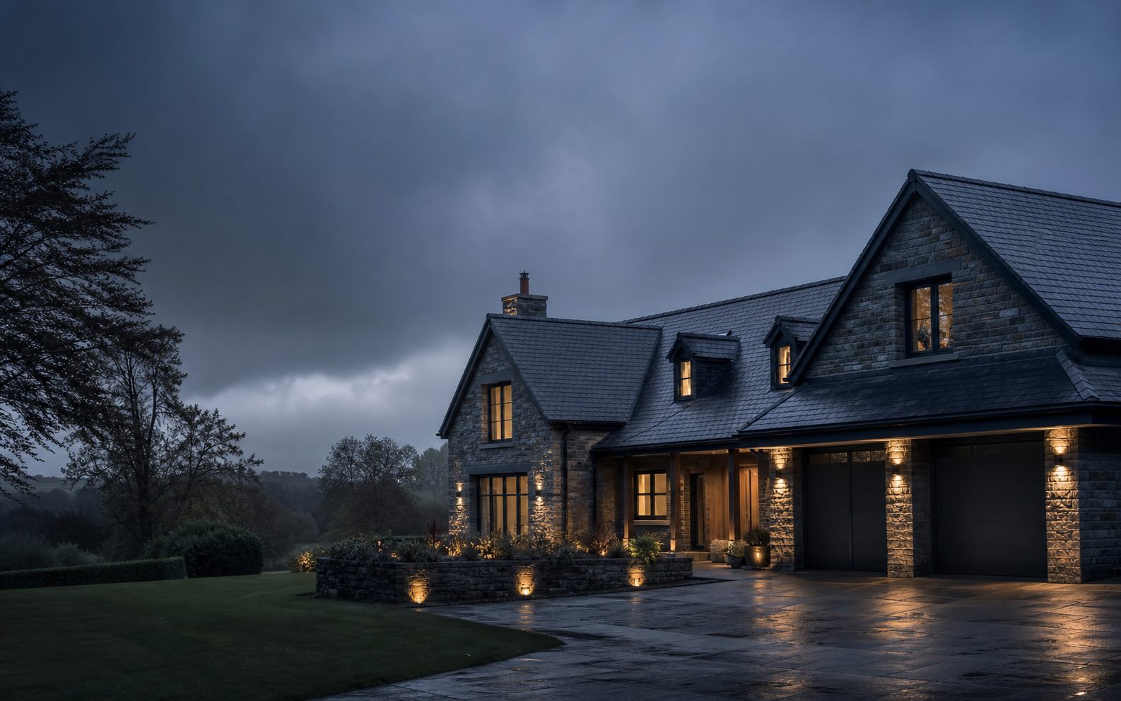 Modern slate roof on a premium home at dusk